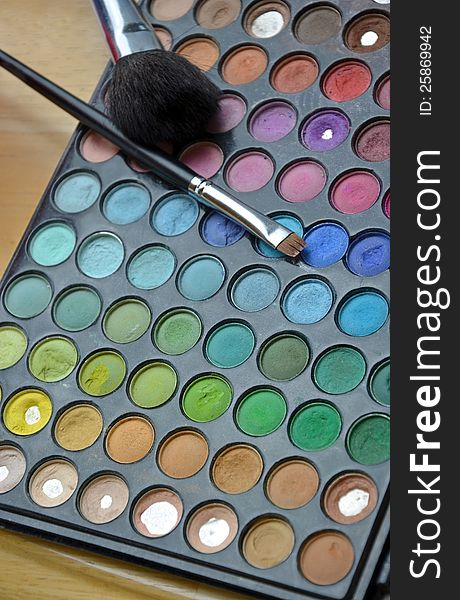 Colorful eye makeup tray with brushes