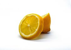 Close-up Photo Of A Lemon And Lemon Slices. Stock Photo