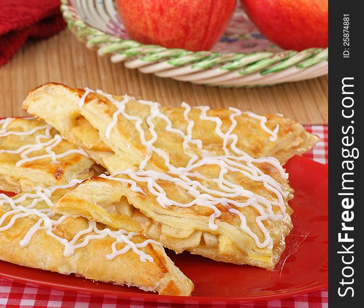 Apple turnover pastries on a serving plate