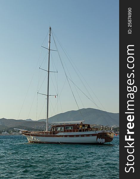 Anchored yacht in Bitez bay, Bodrum district (MuÄŸla Province) in summer, Turkey