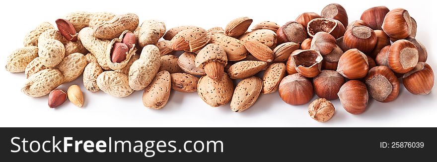 Group mixed nuts. Macro shot on white background.