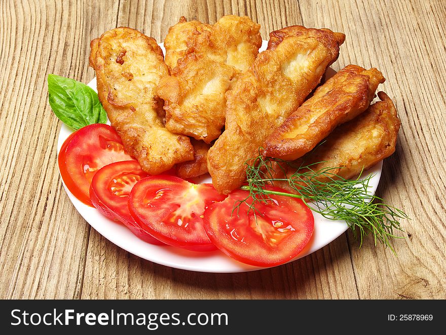 Fish Fried In Dough On A Plate