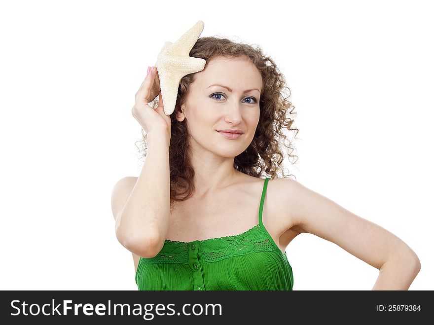 Beautiful girl holding a starfish isolated