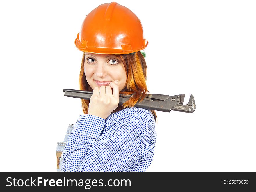 Builder girl in a helmet and a key