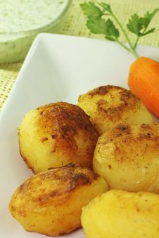 Potatoes And Carrots Sautéed With Green Sauce Royalty Free Stock Photography Potatoes And Carrots Sautéed With Green Sauce Royalty Free Stock Photography