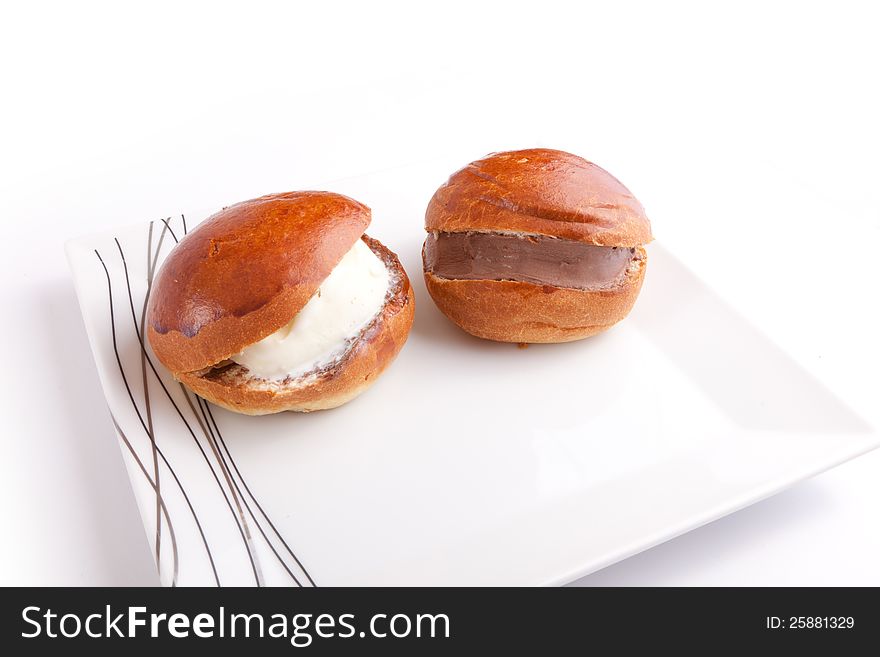 Tow Ice Cream Sandwich On White vanilla and chocolate in bread