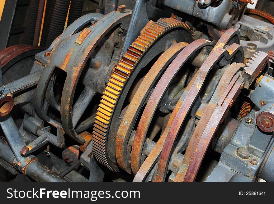 Antique rusty gear mechanism closeup