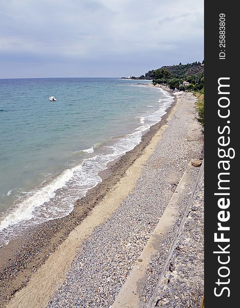 Golf beach with boats in Sithonia peninsula of Halkidiki in Greece. Golf beach with boats in Sithonia peninsula of Halkidiki in Greece