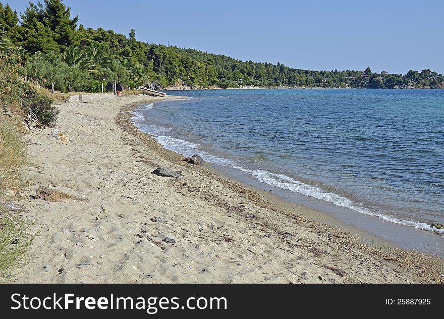 Golf beach with boats in Sithonia peninsula of Halkidiki in Greece. Golf beach with boats in Sithonia peninsula of Halkidiki in Greece