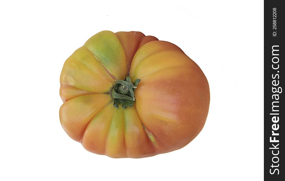 Top View Of A Greenish Red Tomato For Salad Making