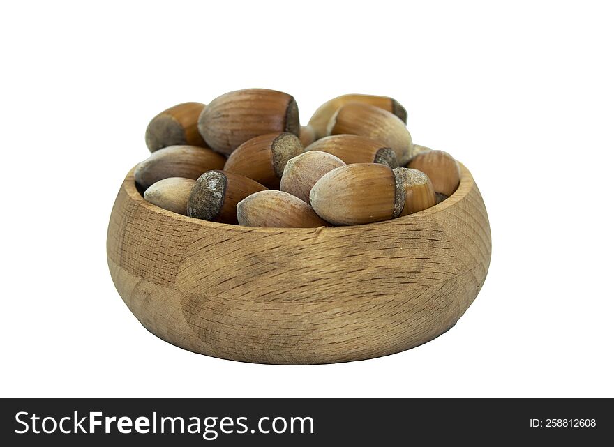 Hazelnuts in a wooden bowl for fresh consumption