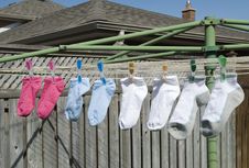 Socks Hanging Outside To Dry Royalty Free Stock Photos