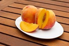 Two Fresh Peaches On While Oval Plate Royalty Free Stock Image Two Fresh Peaches On While Oval Plate Royalty Free Stock Image