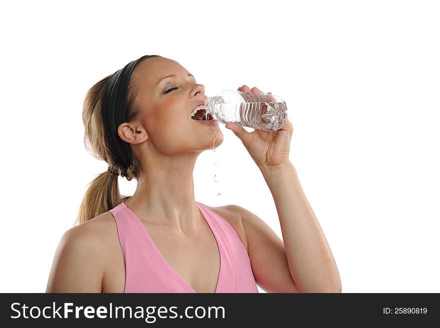 Young woman drinking water isolated on a white background