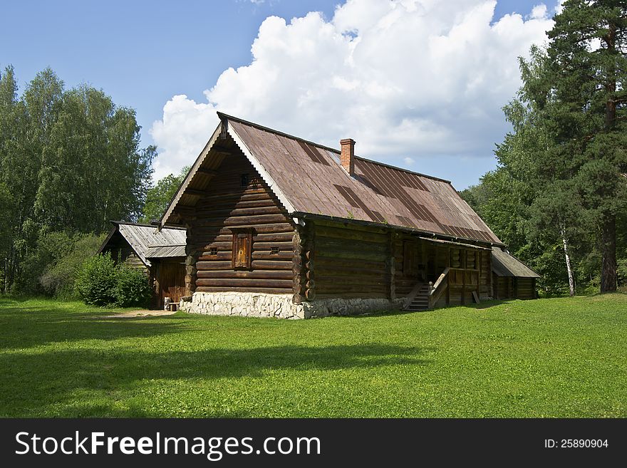 The rural house wooden the log sat down