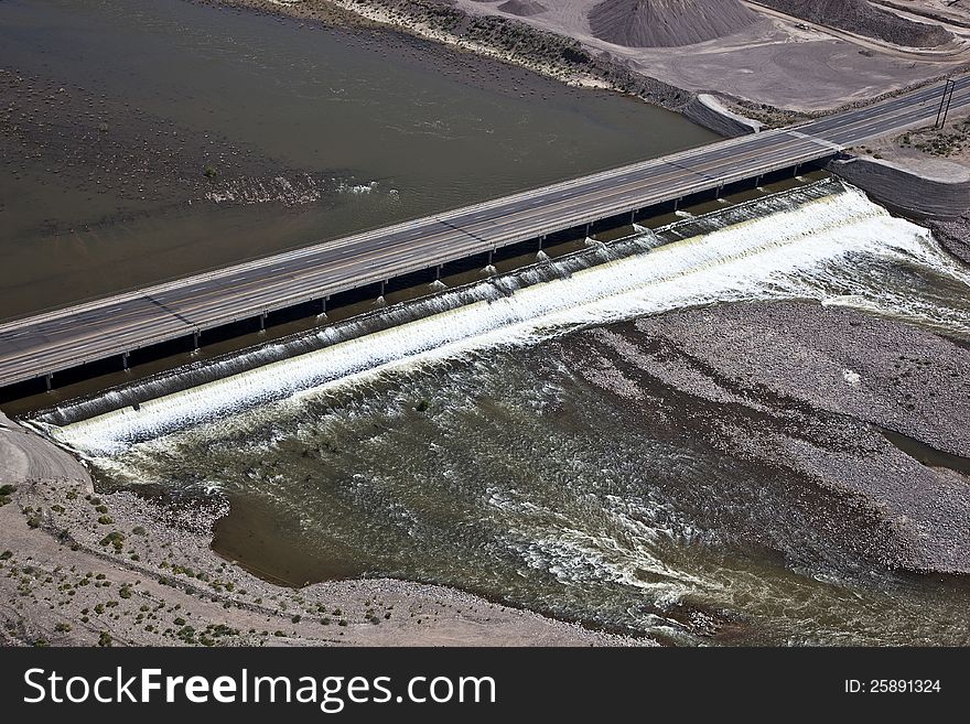 Water running under bridge and road in East Mesa, Arizona. Water running under bridge and road in East Mesa, Arizona