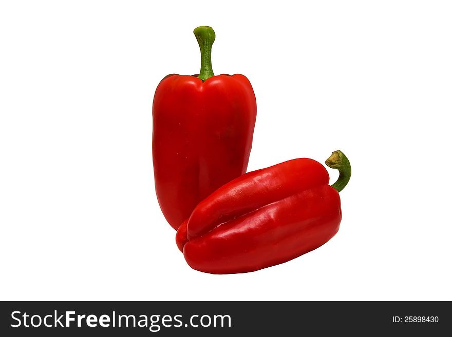 Two red peppers isolated on white background