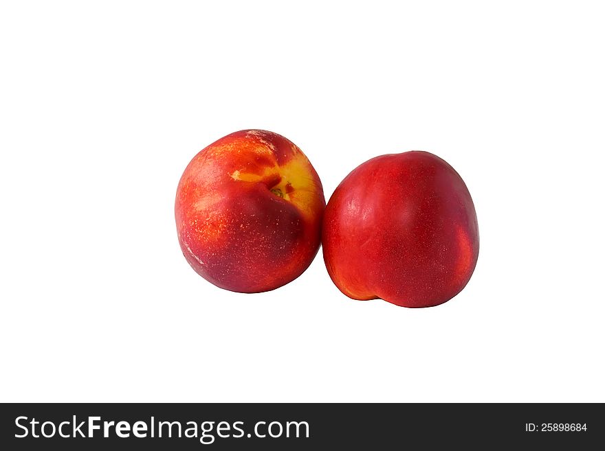 Set of two fresh nectarines isolated on white background. Set of two fresh nectarines isolated on white background