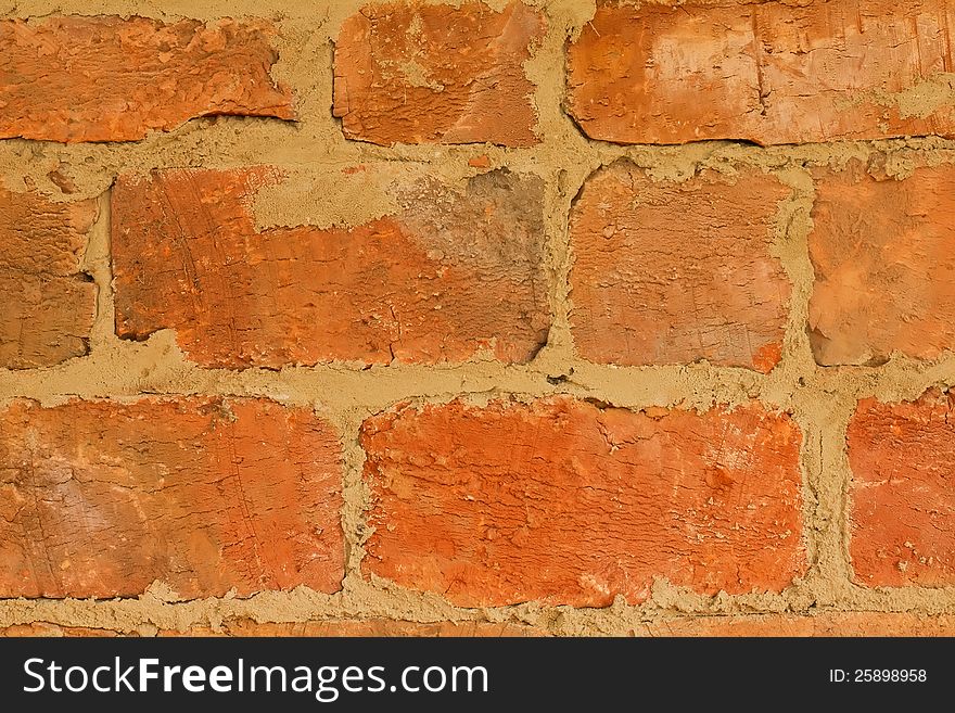 Background of vintage rough brick texture (close-up). Background of vintage rough brick texture (close-up)