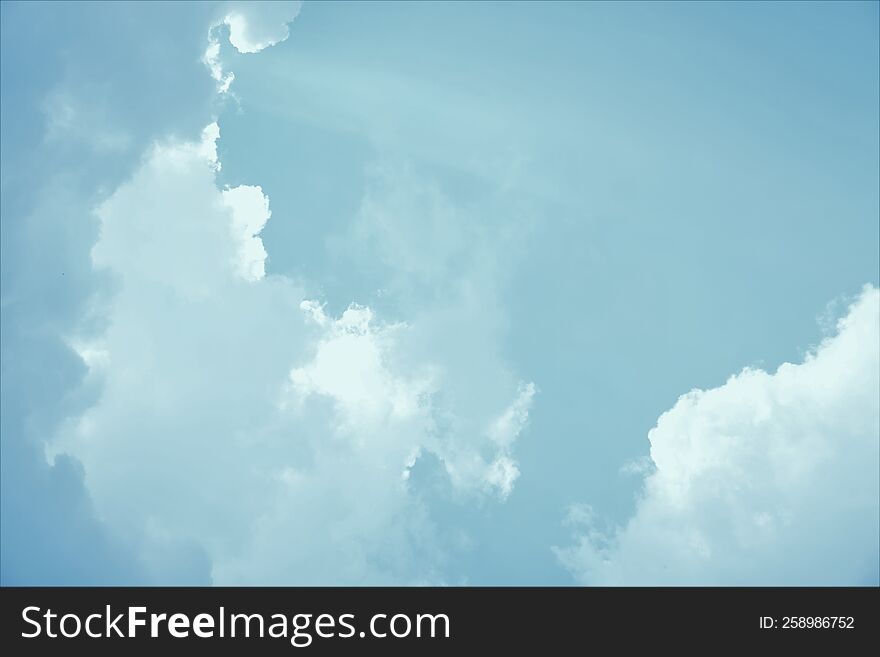 A Juicy Blue Clear Sky And Bright White Cumulus Spring Clouds.