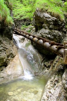 Small Bridge And Waterfall Stock Image