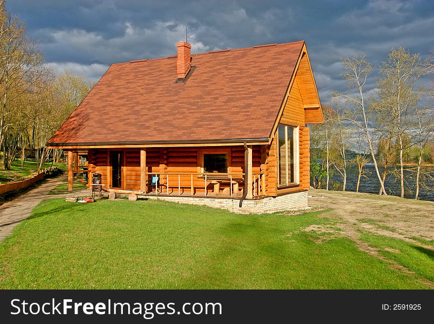 Wooden house. Photo taken just before the storm