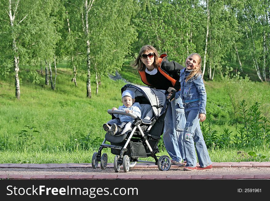 Mother with children on walk