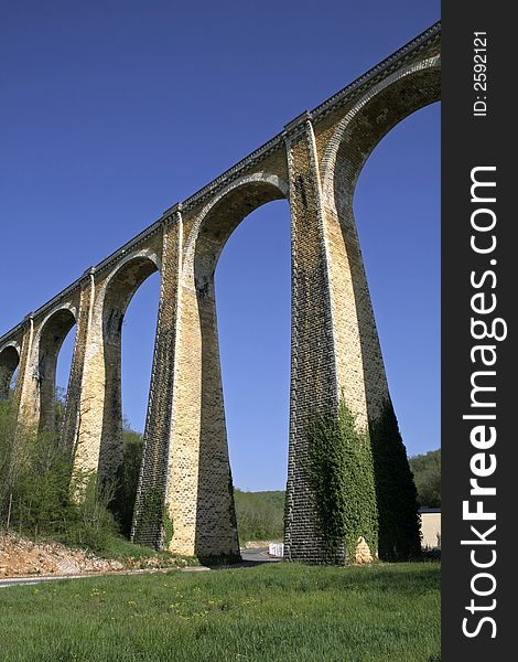 Large arch bridge on blue sky