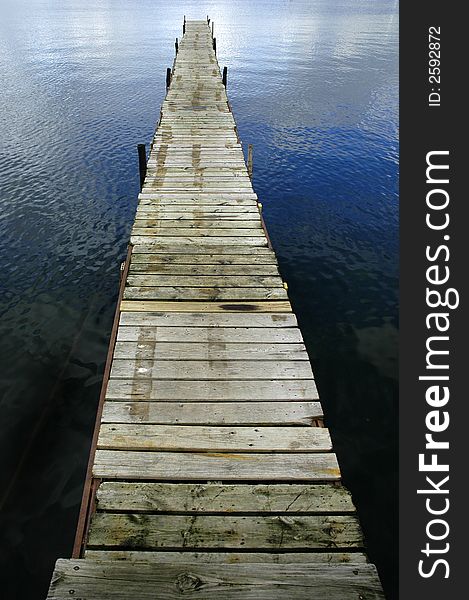 Dock Floating In Blue Water