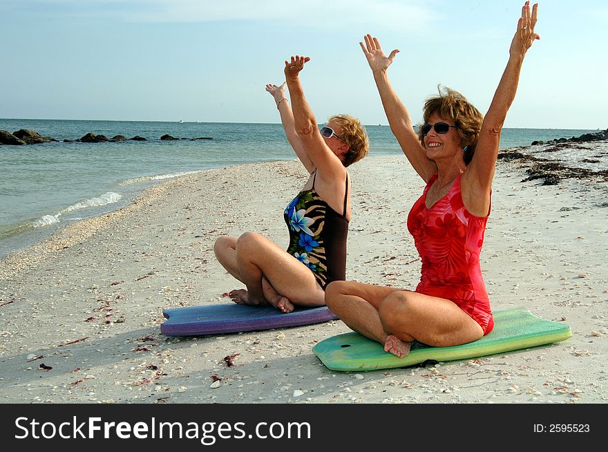 Women Meditation On Beach