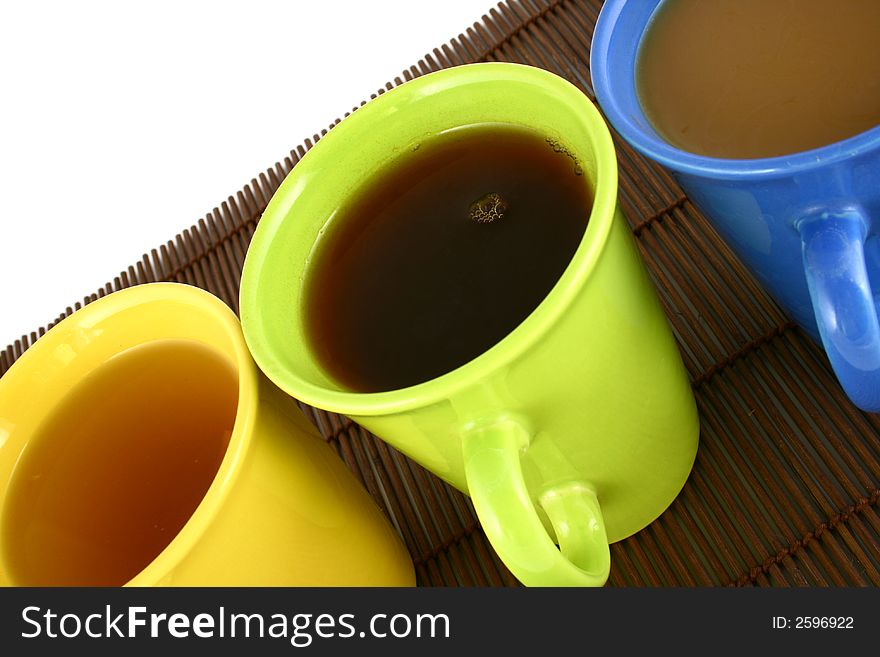 A beautiful cup on white background with coffee and tea. A beautiful cup on white background with coffee and tea