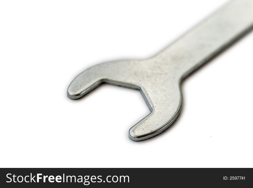 Closeup of a small metal wrench. Closeup of a small metal wrench