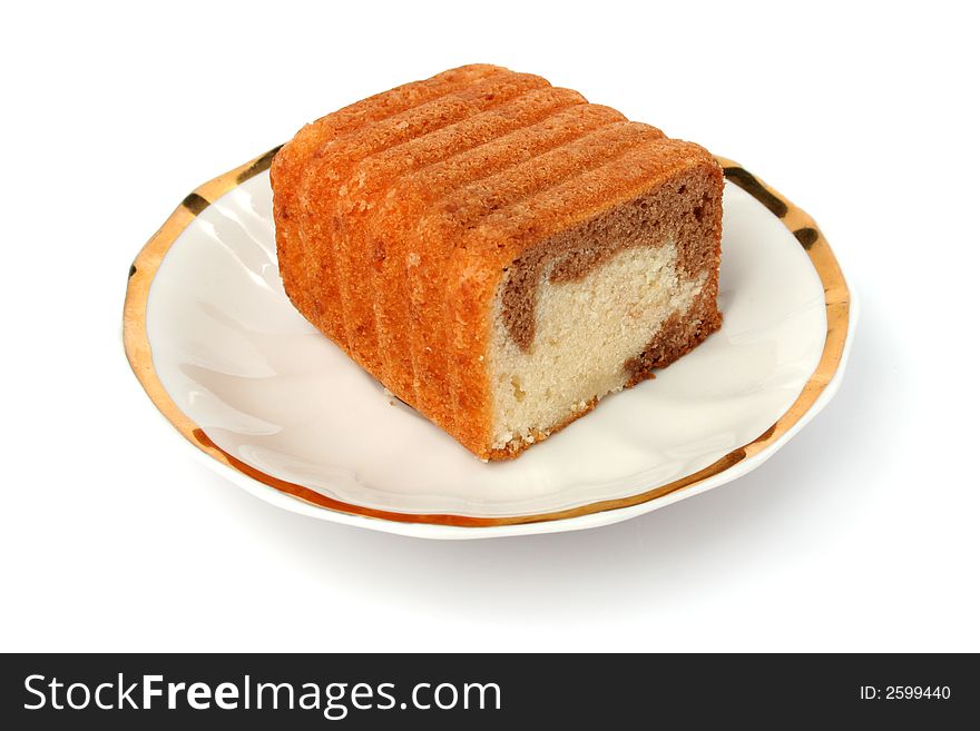 Slices of a chocolate cake on a white background