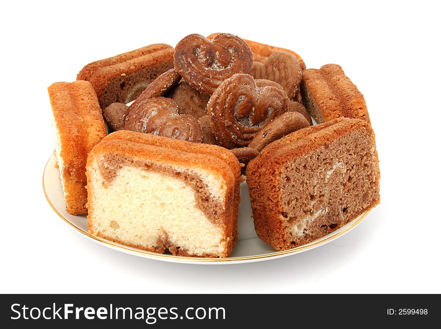 Slices of a chocolate cake on a white background