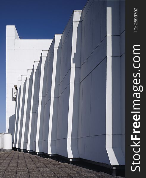 Peculiar graphical detail of a white building. Peculiar graphical detail of a white building