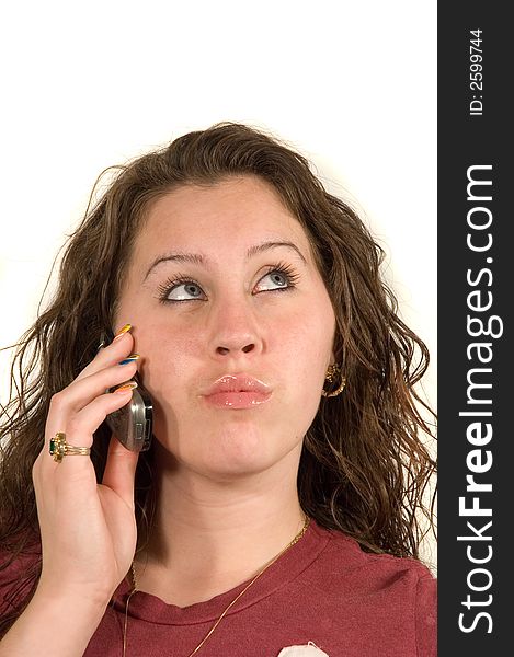 Teenage Caucasian girl on cell phone isoalted over white