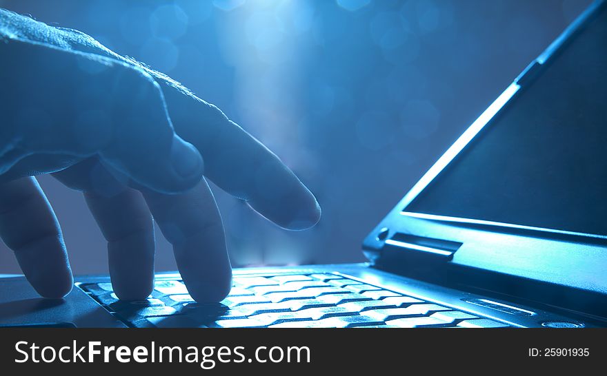 Close-up of typing businessman hands Bokeh. Close-up of typing businessman hands Bokeh