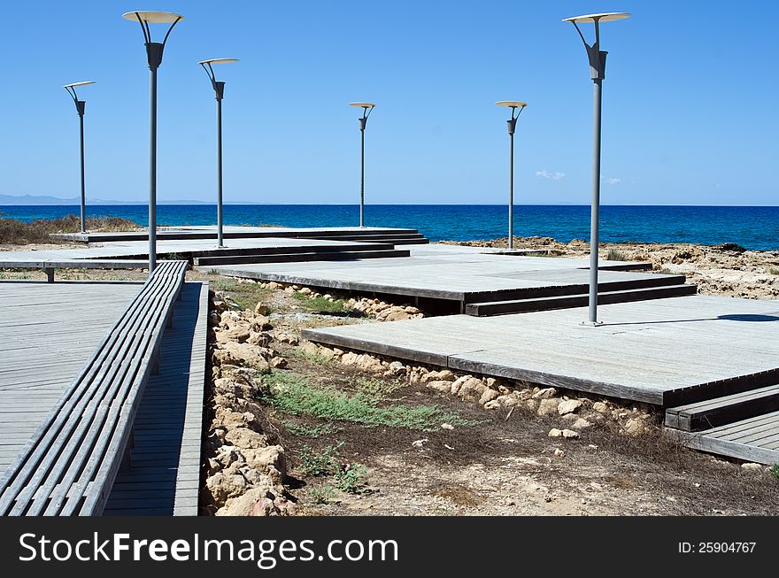 The road to the sea and lampposts in Cyprus