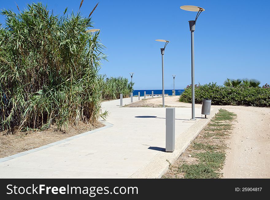 The road to the sea and lampposts in Cyprus