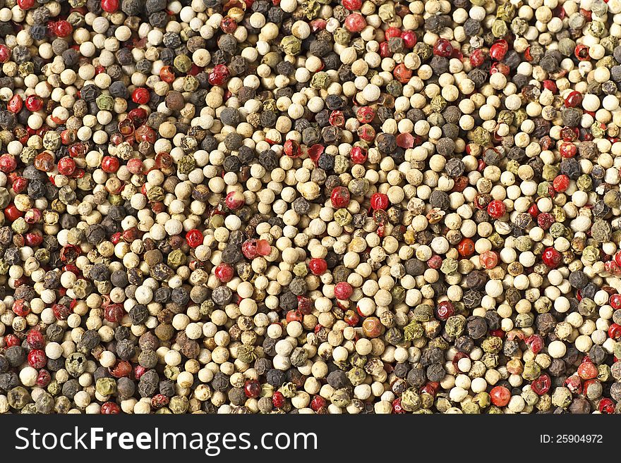 Top view of mixed peppercorns. Top view of mixed peppercorns