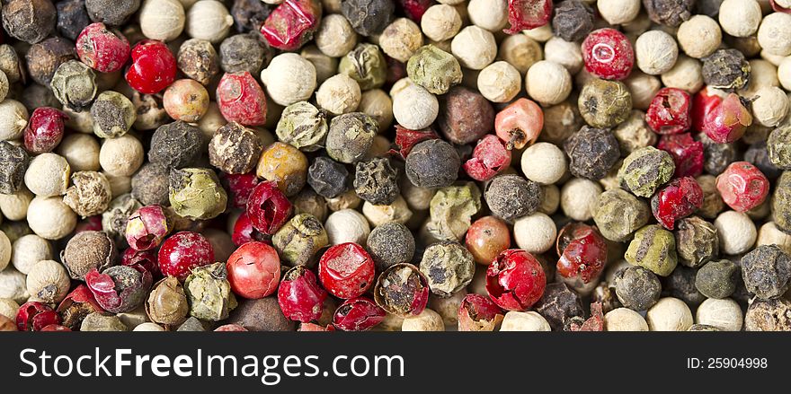 Top view of mixed peppercorns. Top view of mixed peppercorns