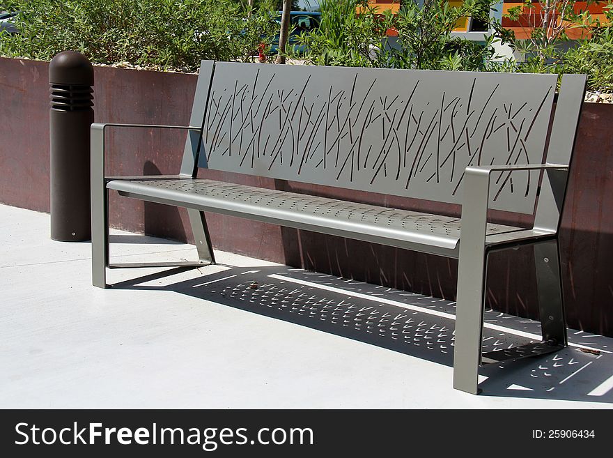 Image of a steel park bench