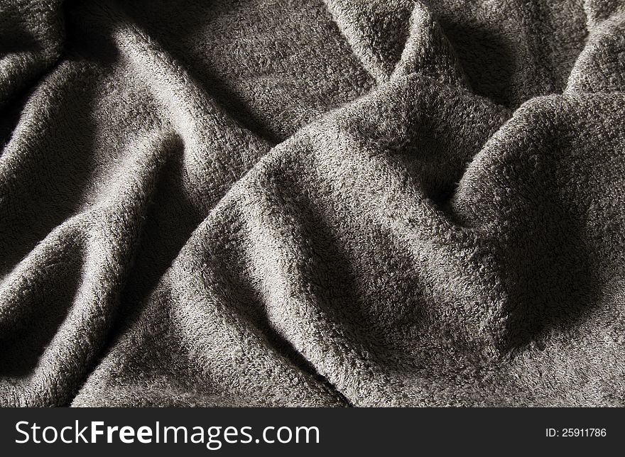 Wrinkles of the grey towel