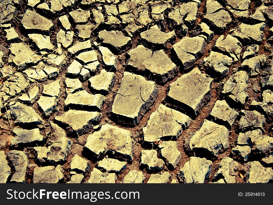 The land was so drought that the soil was cracked. The land was so drought that the soil was cracked.