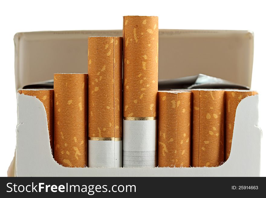 The open pack of cigarettes with filter. The open pack of cigarettes with filter.
