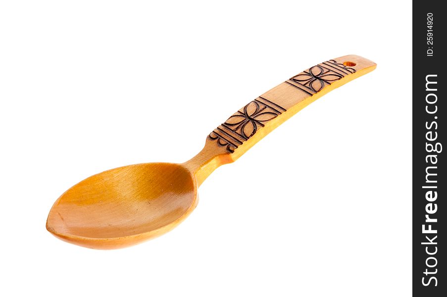 Wooden spoon on the white