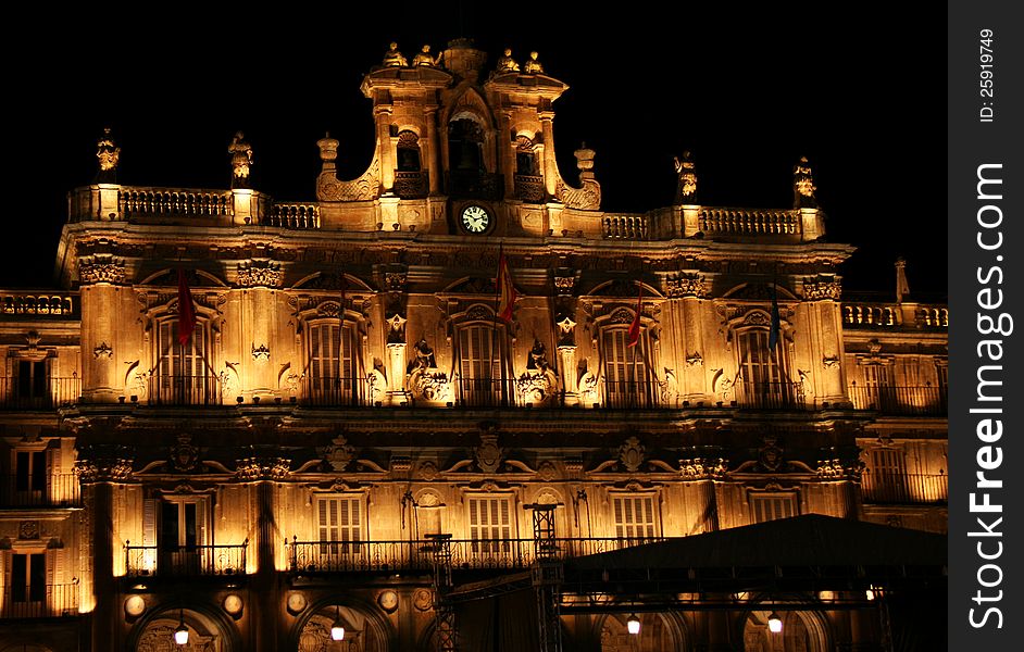 The front of the plaza with clock tower and balconies wonderfully illuminated at night. The front of the plaza with clock tower and balconies wonderfully illuminated at night.