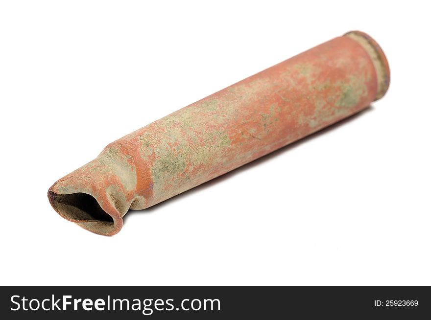 An old rusty rifle cartridge used during World War II on a white background. An old rusty rifle cartridge used during World War II on a white background