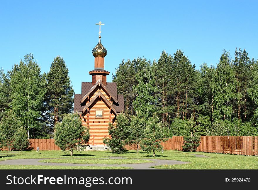 Church among  green trees in the spring morning. Church among  green trees in the spring morning