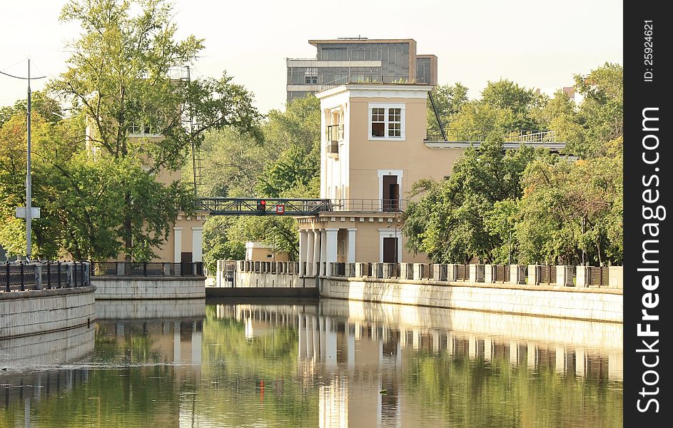 Urban landscape in the morning: gateway on the river. Urban landscape in the morning: gateway on the river